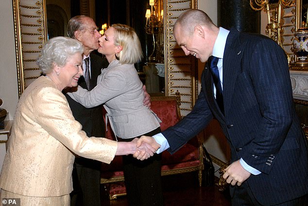 Mike Tindall has revealed what the British Royal Family are really like in private - and why it's 'nothing like Downton Abbey '. Pictured, Mike and Zara greeting the late Queen and Prince Philip in 2006