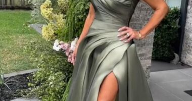 A mother of the bride has raised eyebrows online after opting to wear a glamorous thigh-high split dress to her daughter's wedding - with many accusing her of 'upstaging' the newlywed