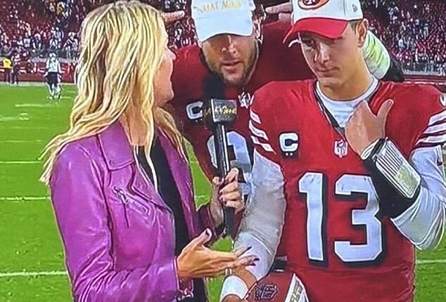 San Francisco 49ers star Nick Bosa (center) wore a MAGA cap live on NBC Sunday night