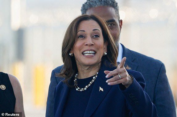 Democratic presidential nominee U.S. Vice President Kamala Harris points her finger at Harry Reid International Airport in Las Vegas, Nevada, U.S., October 9, 2024. REUTERS/Evelyn Hockstein