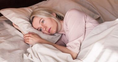 Women aged between 40 and 60 get an average of just 6 hours and 36 minutes of sleep per night due to frequent insomnia and night sweats, a study shows (stock image)