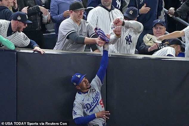 The Yankees fan who tried to rip a ball off Mookie Betts' glove spoke out after the incident