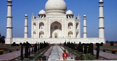 The late princess cut a very lonely figure in front of the Taj Mahal, an ivory white marble mausoleum, which stands as a timeless symbol of love, in 1992
