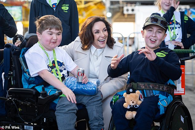 Shirley Ballas looked in high spirits on Sunday, as she attended a hangar party at Heathrow Airport, for Dreamflight's charity trip