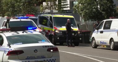 Two men have been shot at an apartment block in Sydney 's west