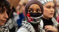 The findings reveal one in ten of those aged 18 to 24 have a ­'favourable view' of Hamas. (Protesters attend a 'Stop The War Coalition')