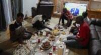 A new surge in migration from Mauritania to the U.S. was made possible by the discovery this year of a new route through Nicaragua, which has relaxed entry requirements. Pictured: Mauritanians gather for a traditional meal, Friday, July 21, 2023, in Cincinnati