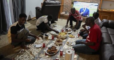 A new surge in migration from Mauritania to the U.S. was made possible by the discovery this year of a new route through Nicaragua, which has relaxed entry requirements. Pictured: Mauritanians gather for a traditional meal, Friday, July 21, 2023, in Cincinnati
