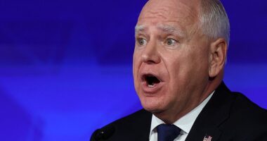Democratic vice presidential nominee Minnesota Governor Tim Walz gestures as he speaks during a debate with Republican vice presidential nominee U.S. Senator JD Vance. During the debate Walz claimed: 'I've become friends with school shooters'