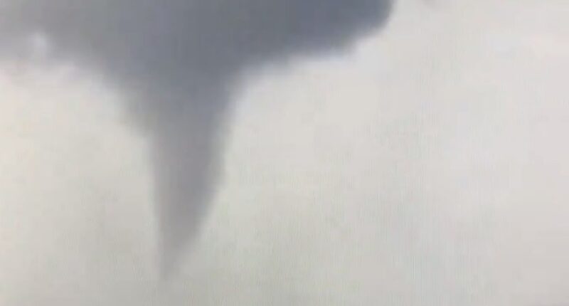 A huge tornado is seen ripping towards the I-75 in Florida today hours before Hurricane Milton is set to make landfall