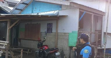 A policeman checks an area on October 18 where an American identified as Elliot Onil Eastman, from Vermont, was reportedly abducted by gunmen in Sibuco town