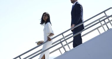 Usha Vance spotted carrying a book as she walked off 'Trump Force 2' with her husband J.D., the Republican vice presidential nominee in July