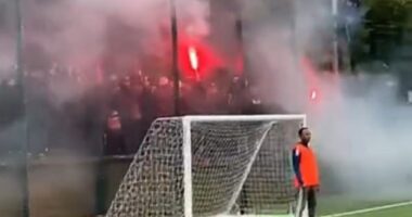 PSG ultras with flares turned up at outside a local five-a-side pitch in London this week