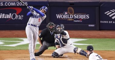 Freddie Freeman hits a two-run home run off Clarke Schmidt to give the Dodgers an early lead