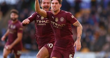 Wolves 1-2 Man City: John Stones' 95th minute winner fires Pep Guardiola's side to the top of the Premier League table in dramatic late turnaround to leave winless hosts bottom of the league