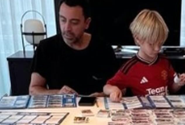 Xavi's wife, Nuria Cunillera, shared a photo on Instagram of her husband son with son Dan, five, while he wore a Manchester United kit