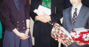 A young Prince William has been pictured beaming alongside his mother Princess Diana in never-before-seen pictures from a visit to The Passage in 1993