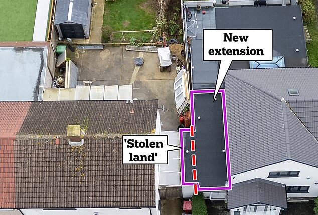 A bitter row has erupted between a Labour councillor and his next door neighbours who have accused him of secretly building an office on their land