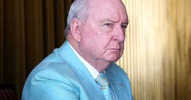 Alan Jones is arrested in his luxury apartment over allegations he indecently assaulted, groped or inappropriately touched multiple young men