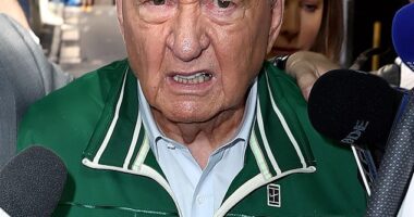 Alan Jones snarled at the media pack as he left Day Street Police Station on Monday afternoon