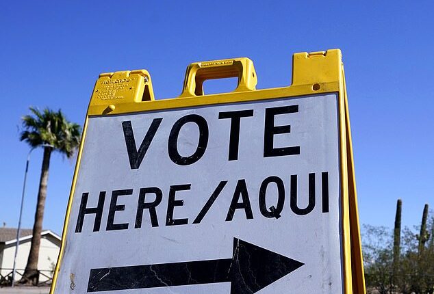 An Arizona 'vote here' sign. The state's Secretary of State said Tuesday that threats in Navajo County are 'unsubstantiated'