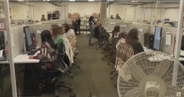 Election workers verifying ballots in Arizona.