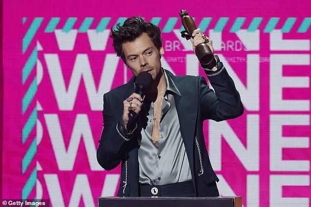 The organisers of the Brit Awards are asking voters to take woke 'conscious voting' diversity lessons ahead of polls opening next month (Harry Styles pictured at 2023 BRITs)