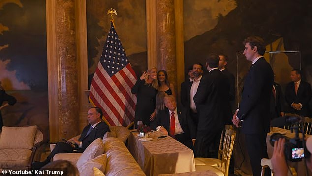 A new video clip posted to Kai Trump's YouTube shows the Trump family – including the towering Barron – watching election night coverage