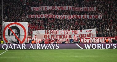 Bayern Munich apologise after ultras display large 'f*** off' banner to PSG chairman and UEFA executive Nasser Al-Khelaifi as he takes seat in stands at Champions League clash