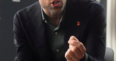 Prince William is seen wearing a home-made friendship bracelet while talking to young people at the Earthshot Prize Climate Leaders Youth Programme in Cape Town yesterday