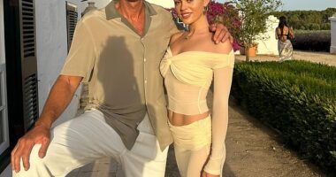 Justin Hemmes, 52, (pictured with his partner Madeline Holtznagel) was allegedly targeted by a man claiming to be a bikie who said he was owed money by the hospitality billionaire