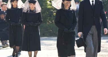 Crown Prince Akishino (right) and Crown Princess Kiko (second right) were in attendance on Tuesday, along with their children Kako, 29, (left) and Hisahito, 18. Second left, Princess Aiko