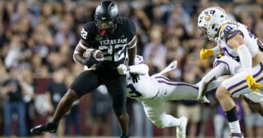 Dad Emmitt Smith 'Proud' of Aggie Son