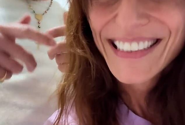 Davina McCall is out of surgery and 'recovering in ICU,' her partner Michael Douglas has confirmed