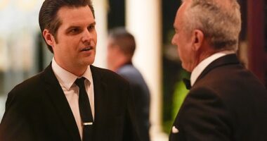 Matt Gaetz talks with Robert F. Kennedy Jr., before President-elect Donald Trump speaks during an America First Policy Institute gala at his Mar-a-Lago estate, Thursday, Nov. 14, 2024, in Palm Beach, Fla. Both have been selected to join Trump's cabinet
