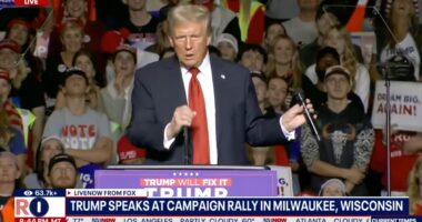 Donald Trump appears to emulate ‘performing sex act’ on microphone stand after he melts down over technical difficulties