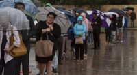 Umbrella-clad Texans (pictured) braved wind and rain to hit the polls on Tuesday, while in Jefferson County, just outside St Louis in Missouri, polling stations are bracing for potential flooding which could cause last-minute chaos
