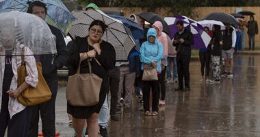 Umbrella-clad Texans (pictured) braved wind and rain to hit the polls on Tuesday, while in Jefferson County, just outside St Louis in Missouri, polling stations are bracing for potential flooding which could cause last-minute chaos
