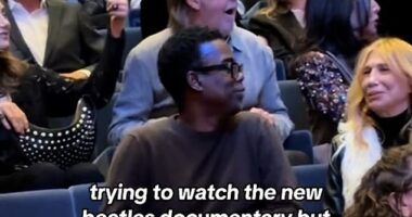 Fans were left in shock after Paul McCartney snuck into the Beatles '64 documentary premiere in NYC on Sunday alongside his wife Nancy Shevell