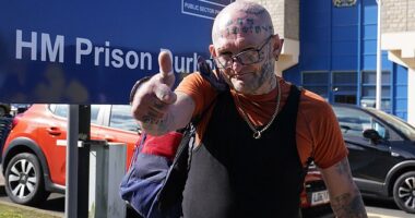 Jason Hoganson, with his face crisscrossed with angry scars and his head covered in distinctive tattoos, gave a jubilant thumbs up to the camera as he left prison