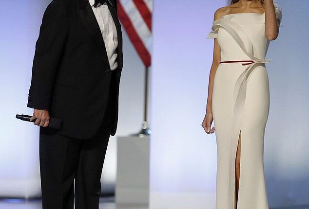 She's set to return to the White House in January - and Melania Trump will no doubt bring a lavish wardrobe filled with clothes that didn't previously fit the mould of First Lady (pictured: Donald and Melania Trump at the Inauguration Freedom Ball in Washington in January, 2017)