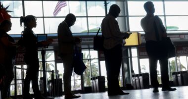 Jobless claims slide to 7-month low. Businesses not cutting many jobs.