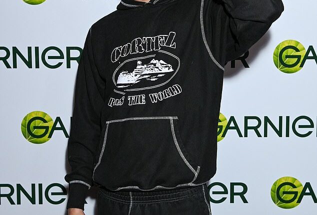 Junior Andre cut a cool figure on Wednesday as he joined in the fun at Garnier's celebration hair mask party in London