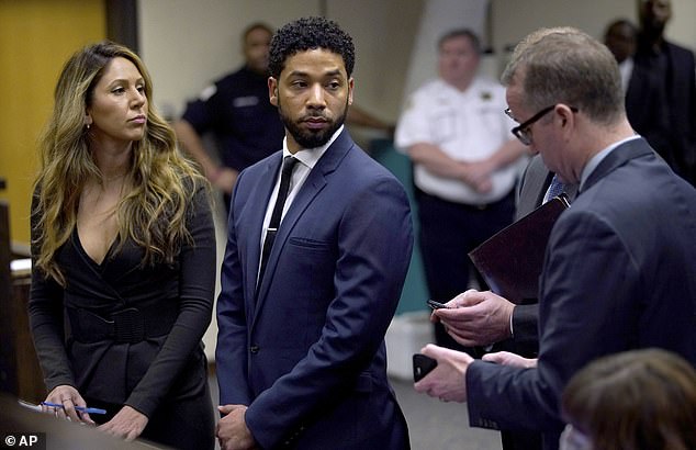 Jussie Smollett, seen in court in March 2019, has had his conviction for lying to the police with a bizarre anti-Trump hoax overturned in a sensational ruling from the Illinois Supreme Court