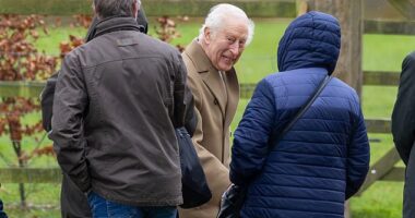 King Charles braved the stormy weather as he attended a church service alone in Sandringham today - as Queen Camilla continues to recover from a chest infection