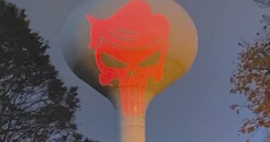 Officials and residents in Hanson, Massachusetts, are up in arms over the display, which first surfaced after Trump's pronounced win on Wednesday. It show a skull logo with Trump-esque hair in the style of the Marvel hero, and is being projected from the house of a resident nearby