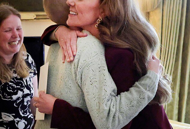 The Princess of Wales pictured sharing a tender hug with Liz Hatton when they met at Windsor Castle in October and bonded over their shared love of photography