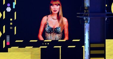 Taylor Swift appeared via video link while accepting  the Best Video award at the MTV EMAs on Sunday evening - one of four awards she won on the night
