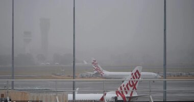 Melbourne Airport is seen shrouded in thick fog on Tuesday morning