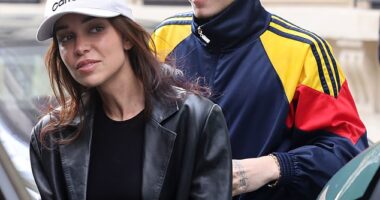 Jackie Apostel, 29, and Cruz Beckham, 19, leaving their hotel during Paris Fashion Week, where they attended his mother Victoria Beckham's show